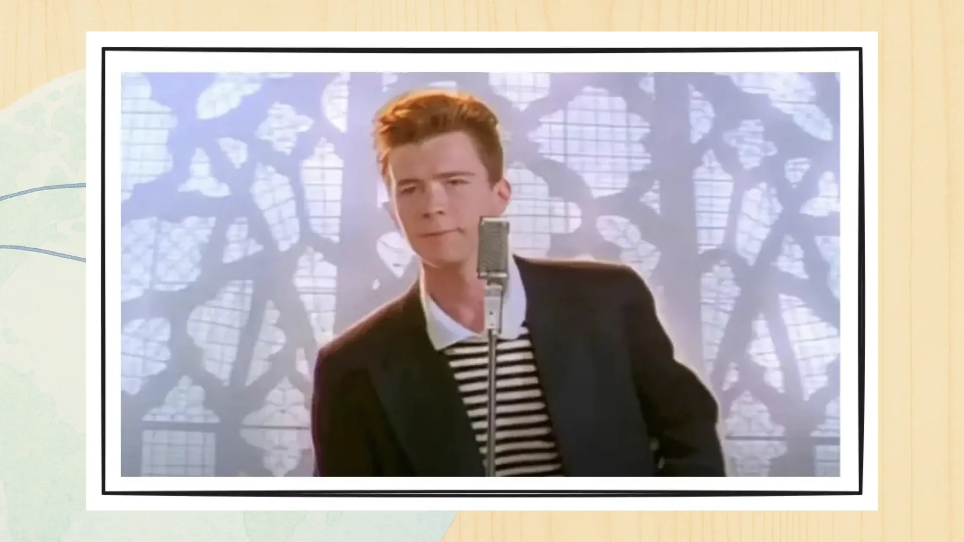 A picture of Rick Astley. The visual/audio joke is that 'picture of rick' is intentionally pronounced like 'Pickle Rick'.