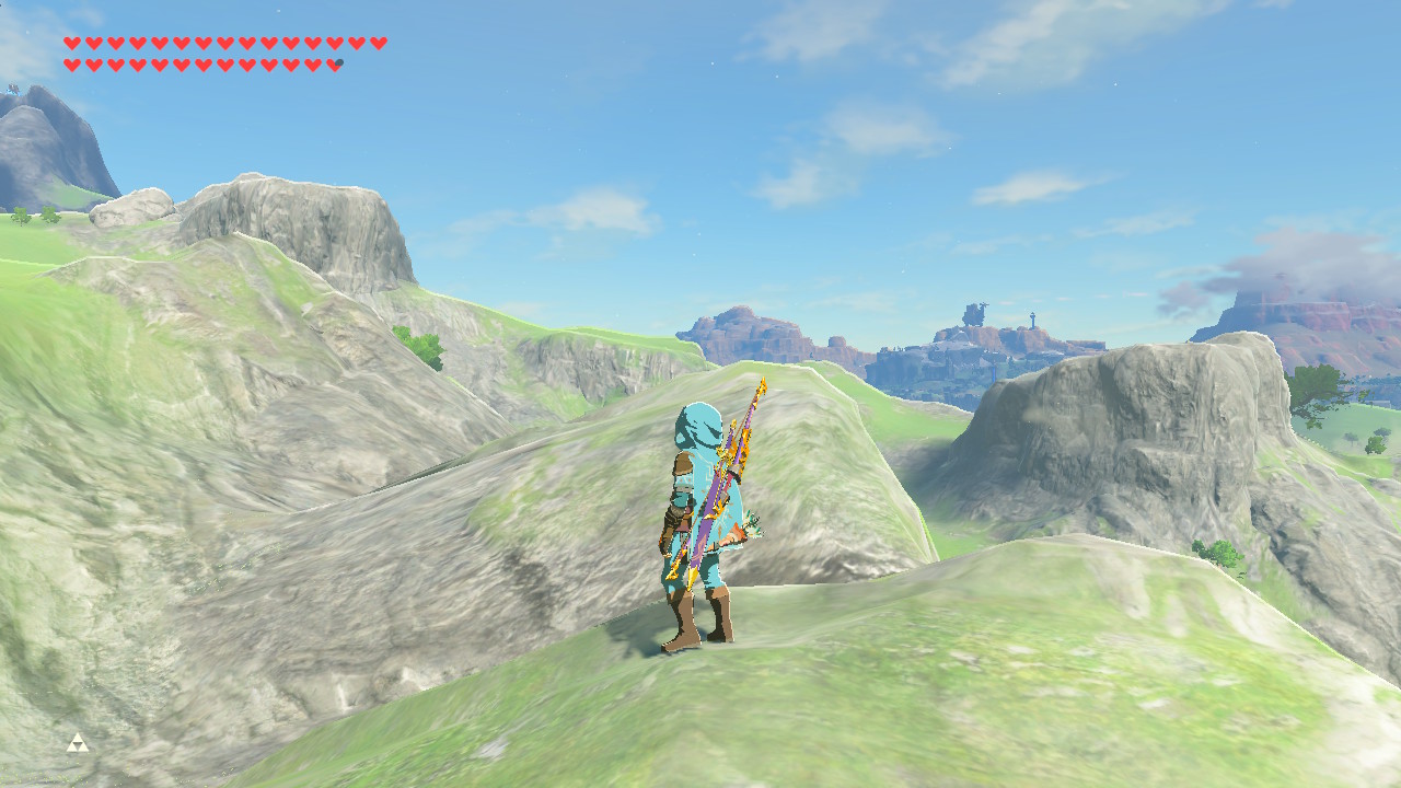 Link looking out over the rocks to the southeast near Lake Hylia in The Legend of Zelda: Breath of the Wild